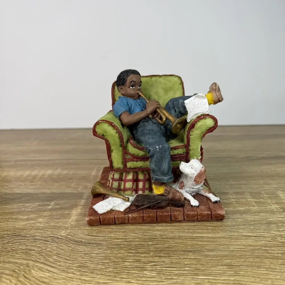 Vintage Boy Figurine Sitting On Chair with Saxophone and Dog Figure